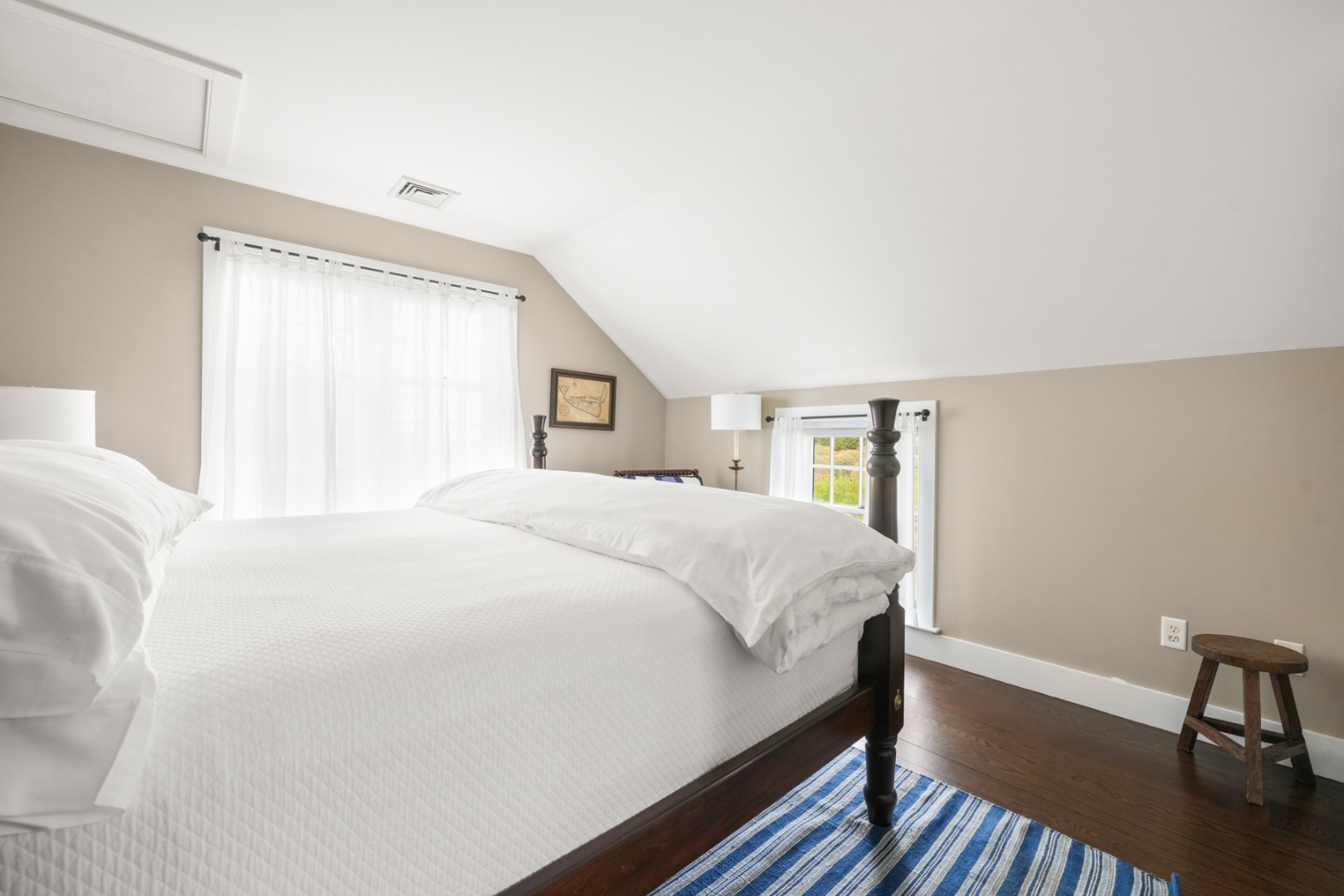 21 Quidnet Road Nantucket, MA 02554 - Photo 46 of 62 a bedroom with a bed and a table