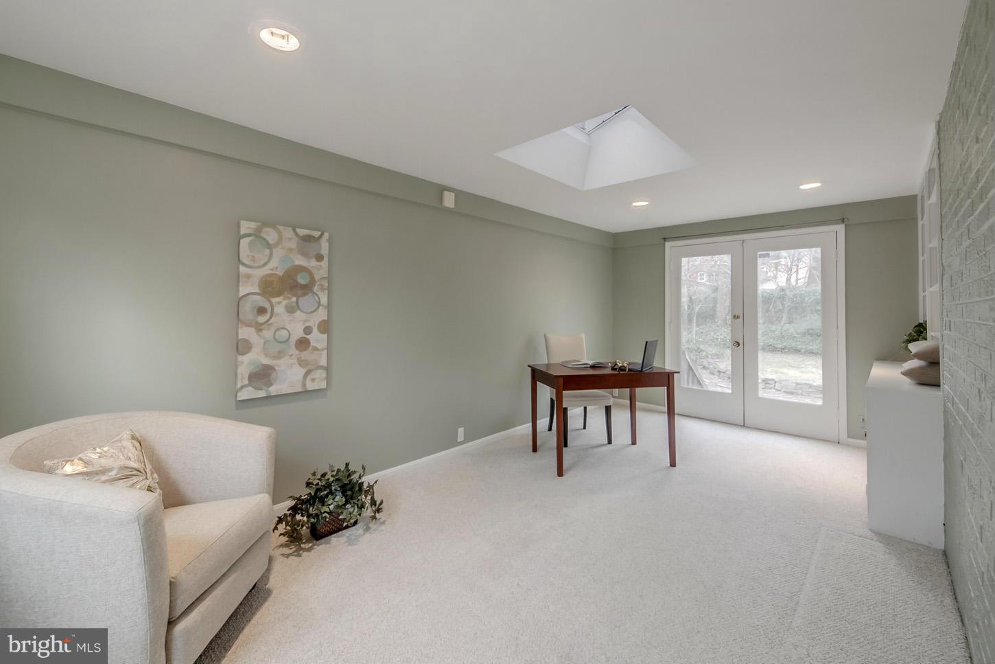 9521 Thornhill Road Silver Spring, MD 20901 - Photo 14 of 30 a living room with furniture and a large window