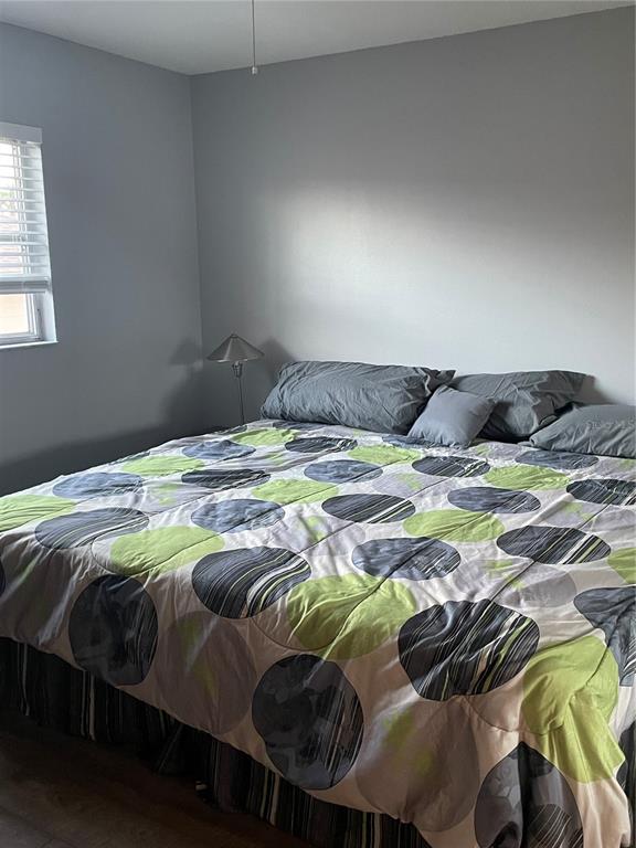 14531 Walsingham Road, Unit 203 Largo, FL 33774 - Photo 20 of 24 a bedroom with a bed and a window