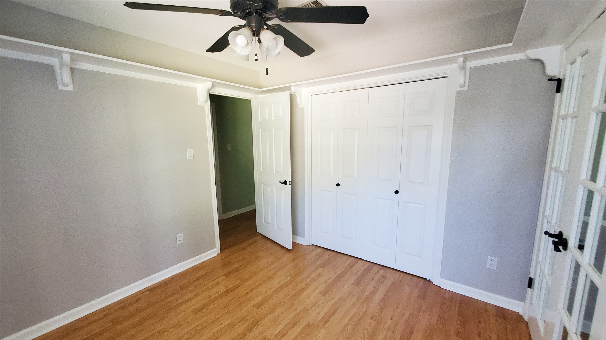201 Rio Vista Drive Georgetown, TX 78626 - Photo 19 of 26 Well-appointed bedroom with hardwood flooring and ample closet space.