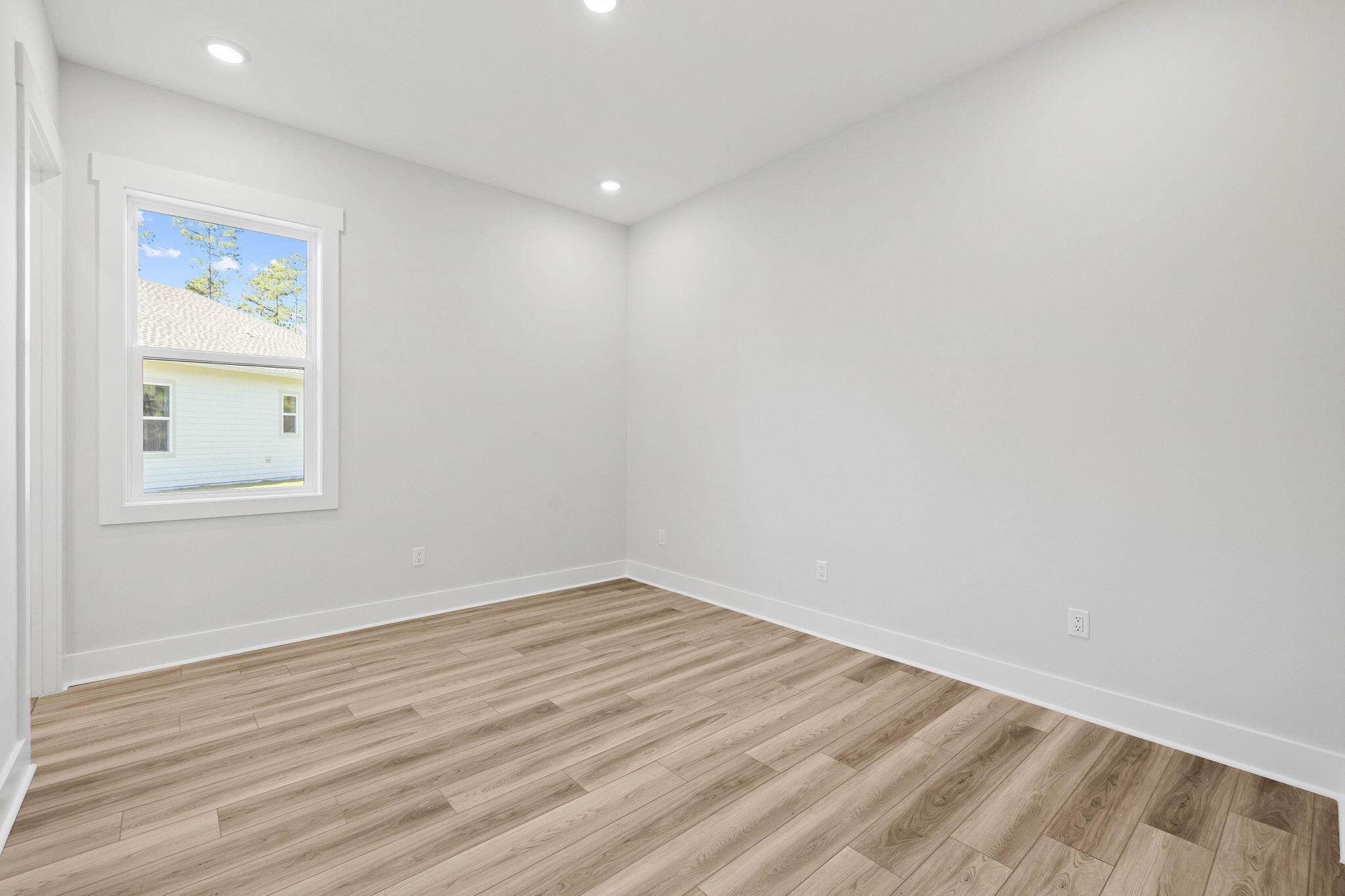 58 Ferndale Court Inlet Beach, FL 32461 - Photo 22 of 37 an empty room with wooden floor and windows