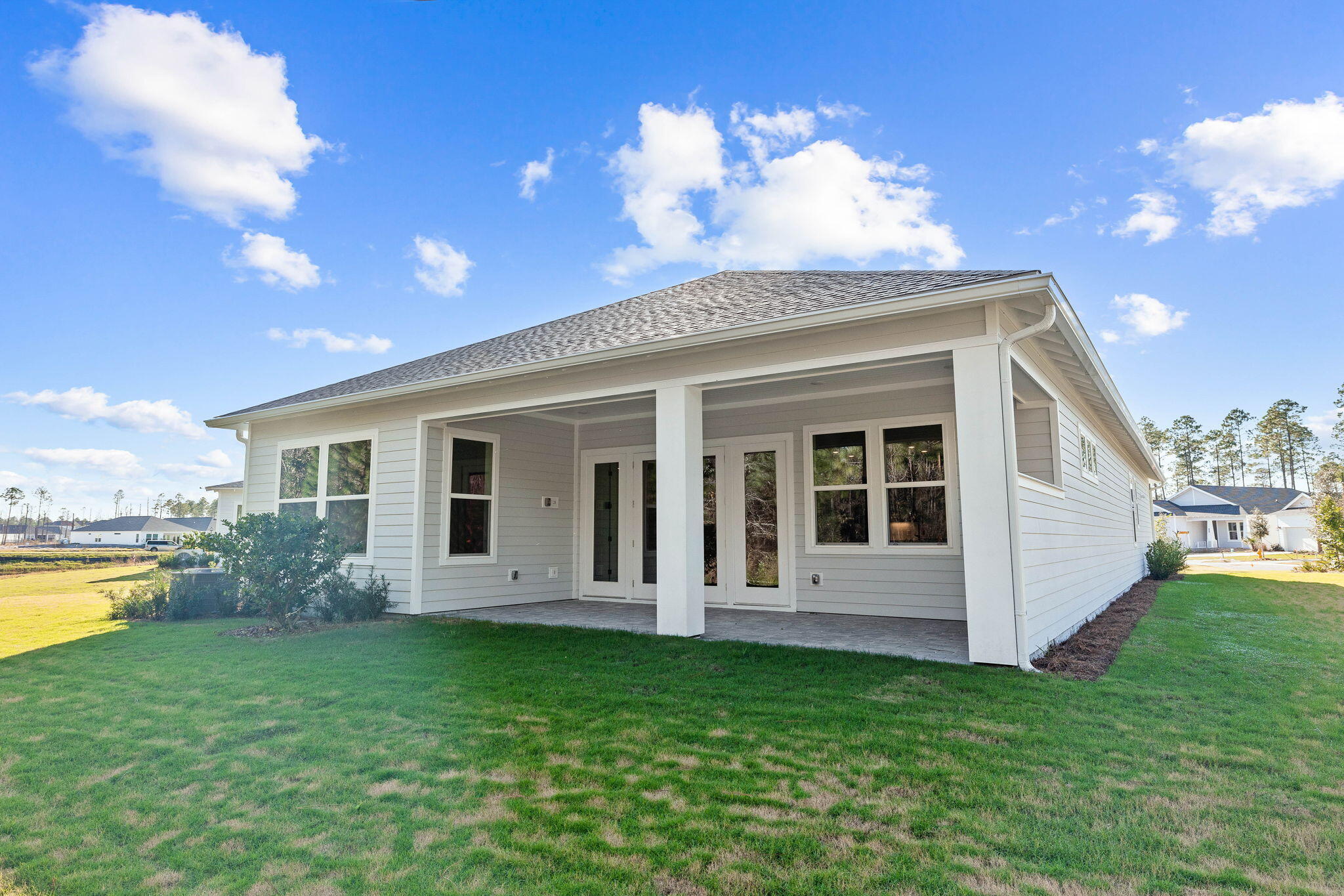 58 Ferndale Court Inlet Beach, FL 32461 - Photo 30 of 37 a view of a house with a yard