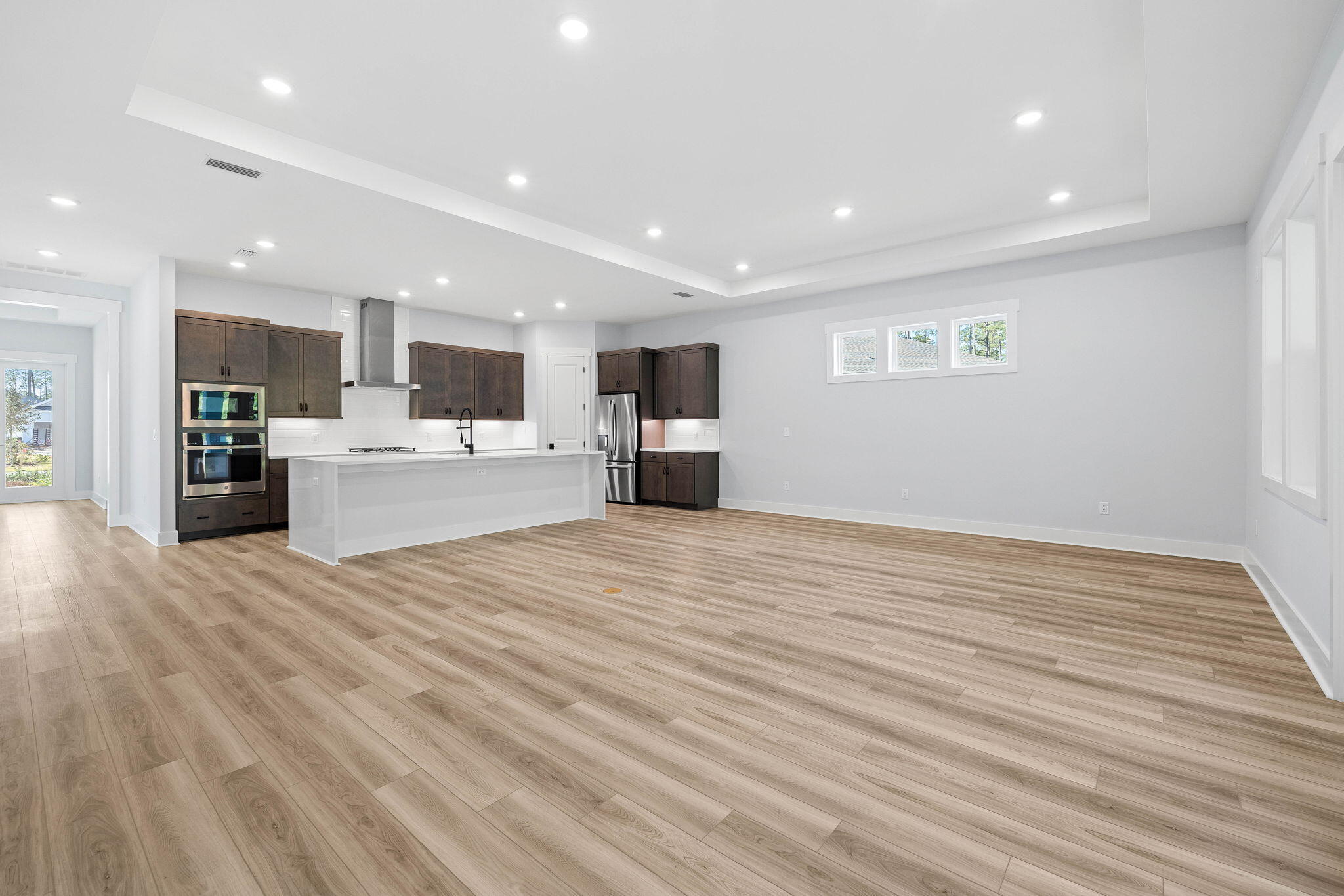 58 Ferndale Court Inlet Beach, FL 32461 - Photo 6 of 37 a view of a kitchen with a sink and a refrigerator