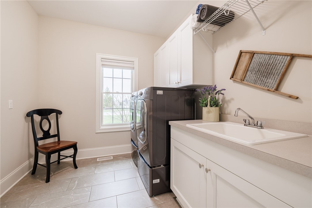 83 Coventry Ridge Pittsford, NY 14534 - Photo 22 of 50 1st floor laundry room.