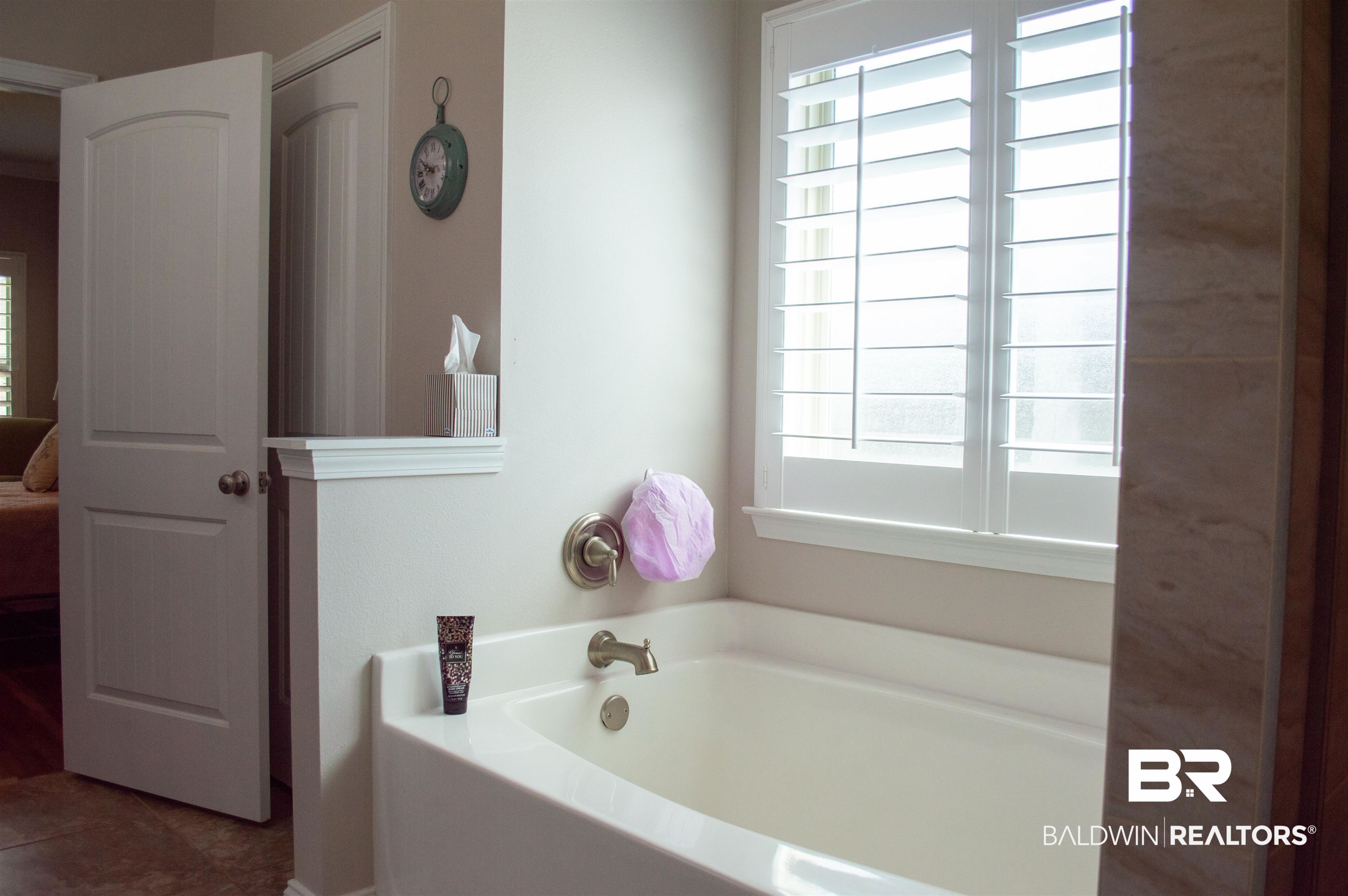 1124 West Orlando Drive Foley, AL 36535 - Photo 26 of 51 Ensuite bathroom featuring a garden tub
