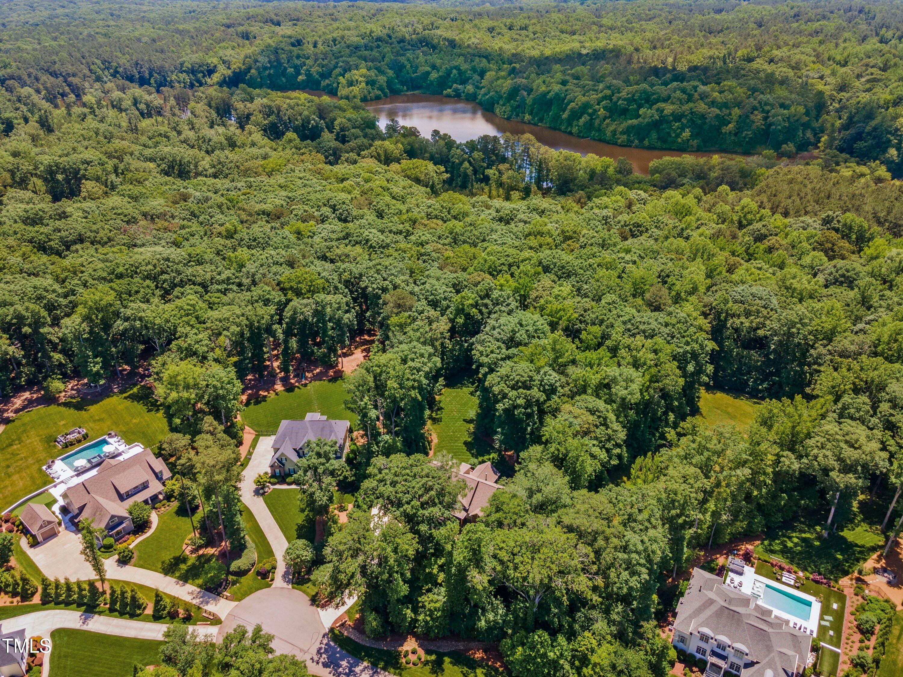 6909 Bartons Bend Way Raleigh, NC 27614 - Photo 42 of 80 You Can See Falls Lake In The Background Of This Drove Photo