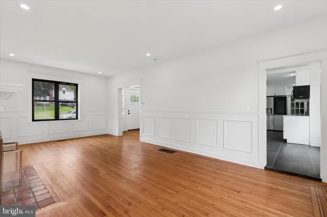 a kitchen with a sink and a window