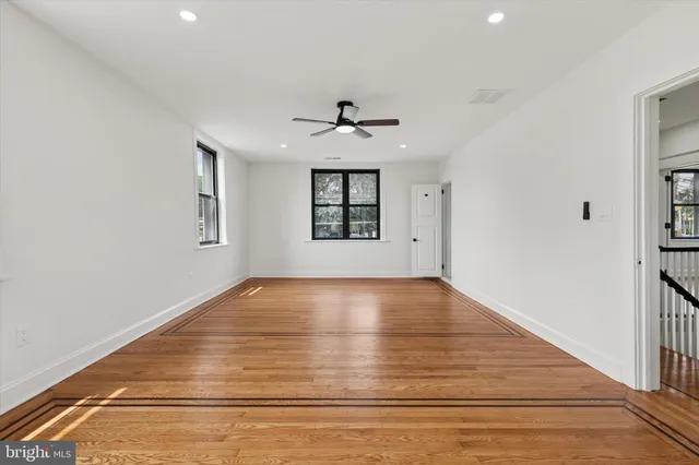 an empty room with windows