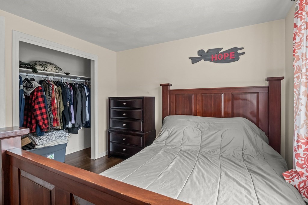 61 Thom Avenue Bourne, MA 02532 - Photo 17 of 32 a bed room with a bed and a closet