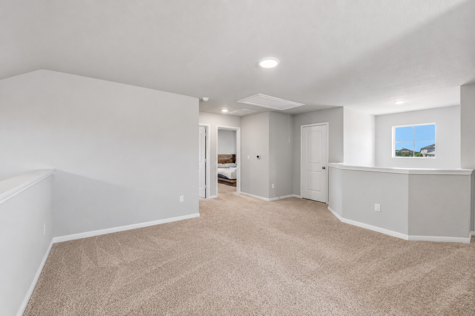 142 Brunnen Way Georgetown, TX 78626 - Photo 16 of 22 A spacious carpeted loft offers additional flexible living space.