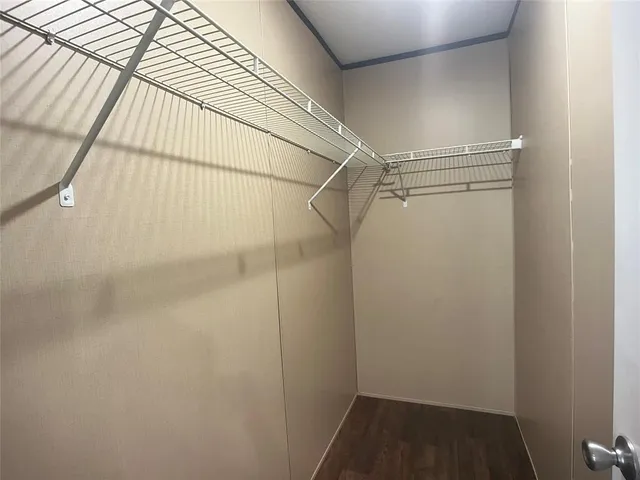 a view of a room with racks on the wall