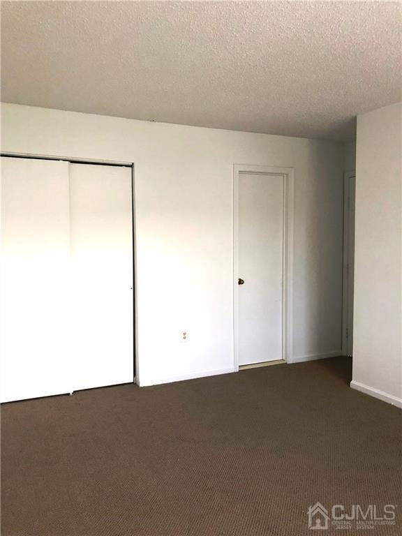 1237 Edpas Road, Unit 1237 New Brunswick, NJ 08901 - Photo 23 of 29 a view of an empty room