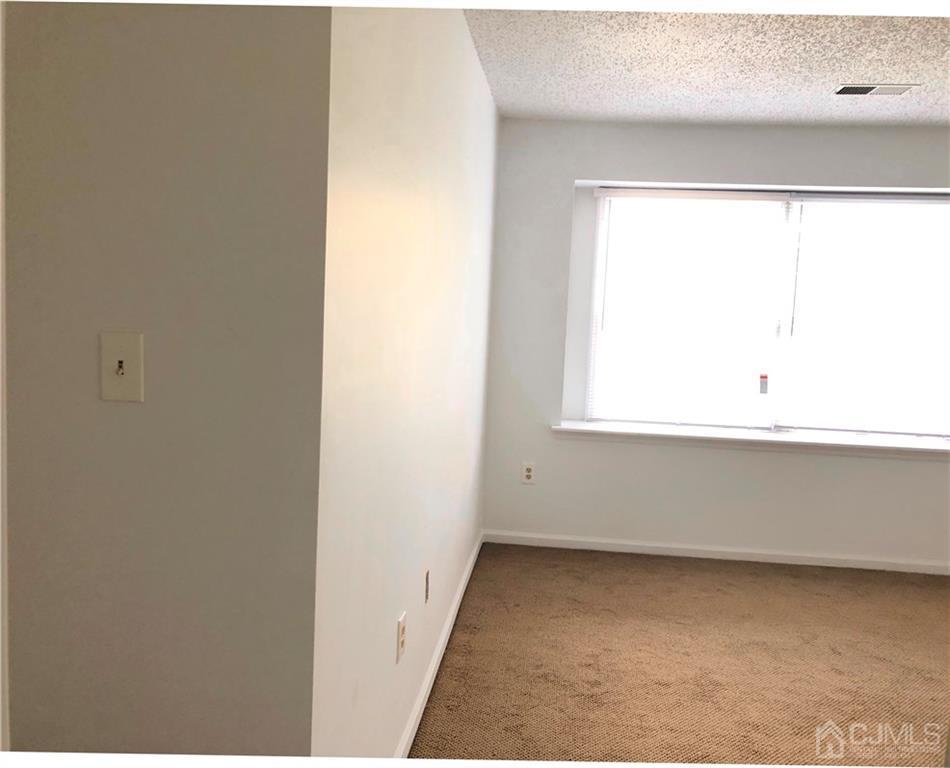 1237 Edpas Road, Unit 1237 New Brunswick, NJ 08901 - Photo 26 of 29 a view of a small space with a window