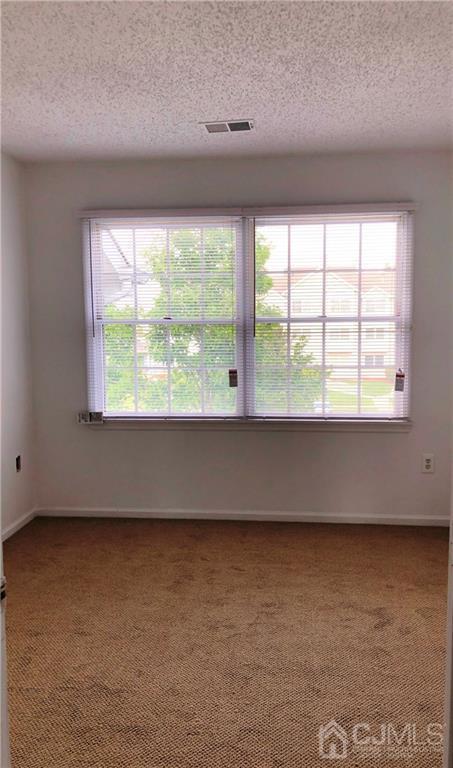1237 Edpas Road, Unit 1237 New Brunswick, NJ 08901 - Photo 8 of 29 an empty room with a window