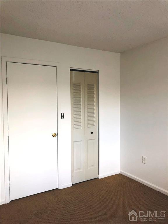 1237 Edpas Road, Unit 1237 New Brunswick, NJ 08901 - Photo 9 of 29 a view of an empty room