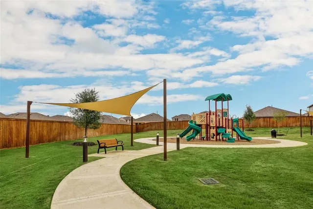 a view of a playground with a slide