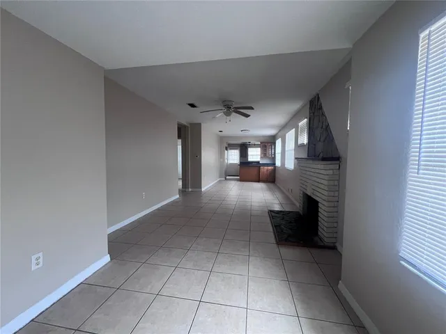 a kitchen with stainless steel appliances granite countertop a stove and a microwave