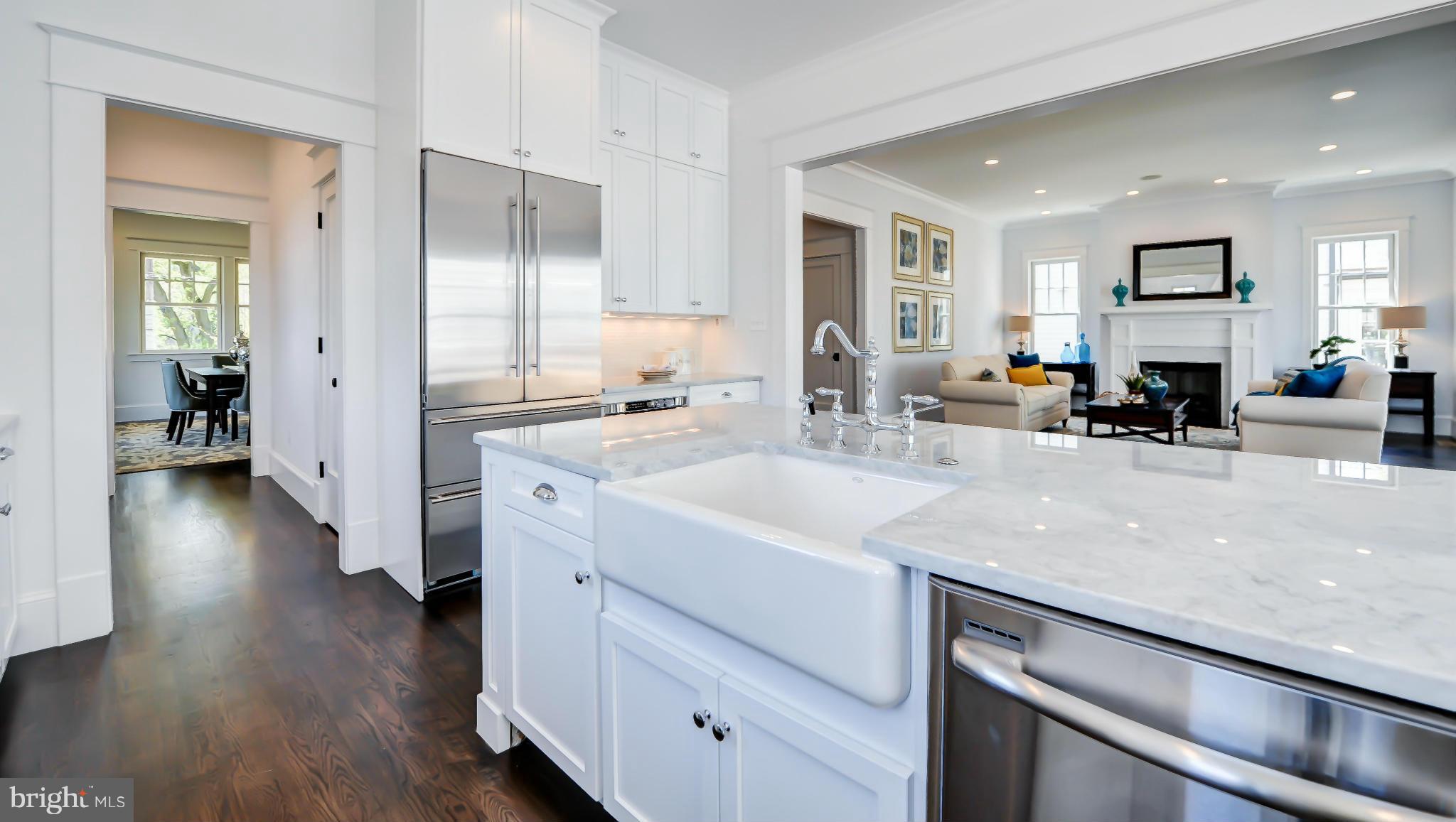 2735 Lorcom Lane Arlington, VA 22207 - Photo 12 of 30 a view of a kitchen counter space and wooden floor