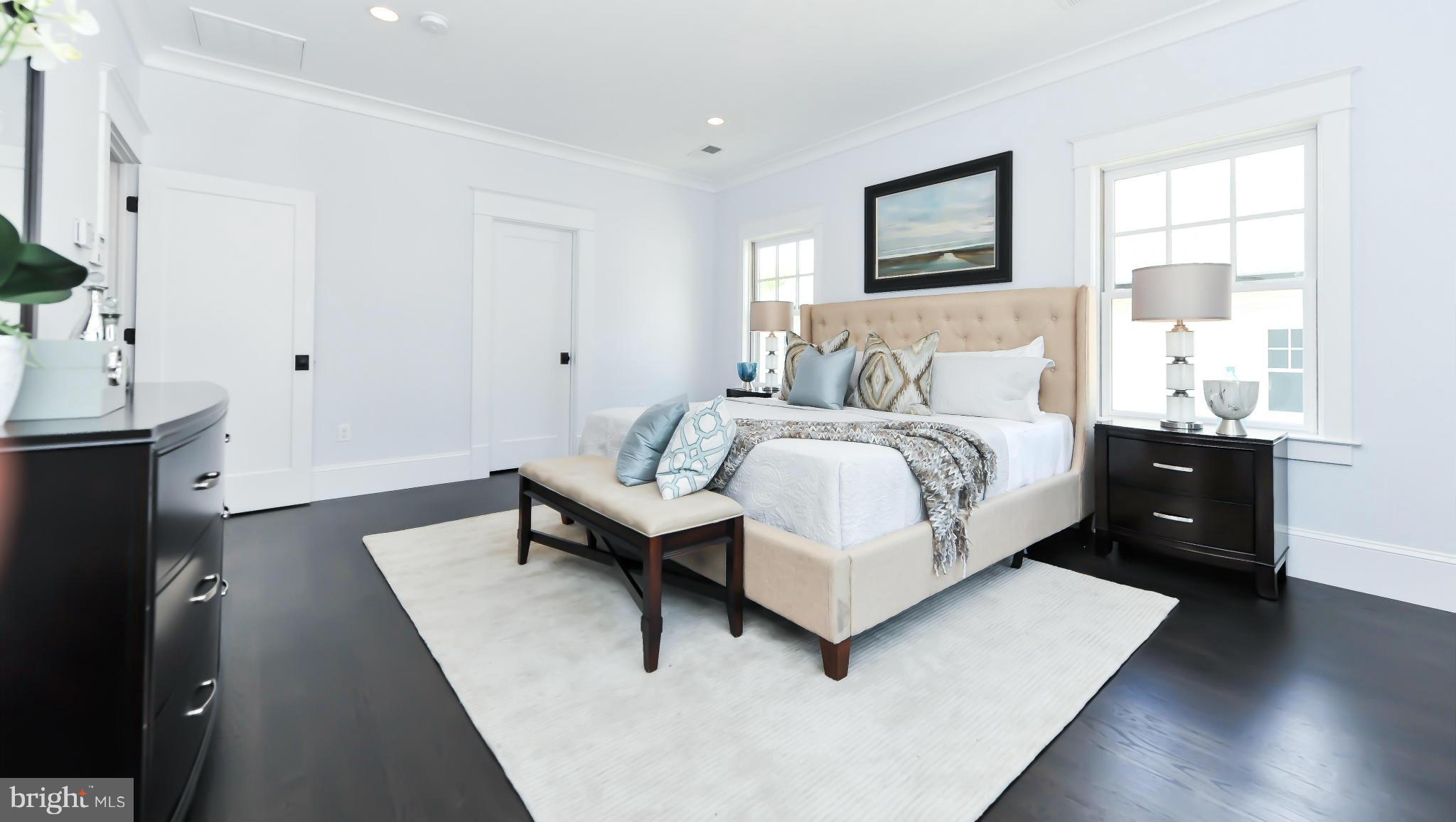 2735 Lorcom Lane Arlington, VA 22207 - Photo 17 of 30 a bed room with a bed and a night stand