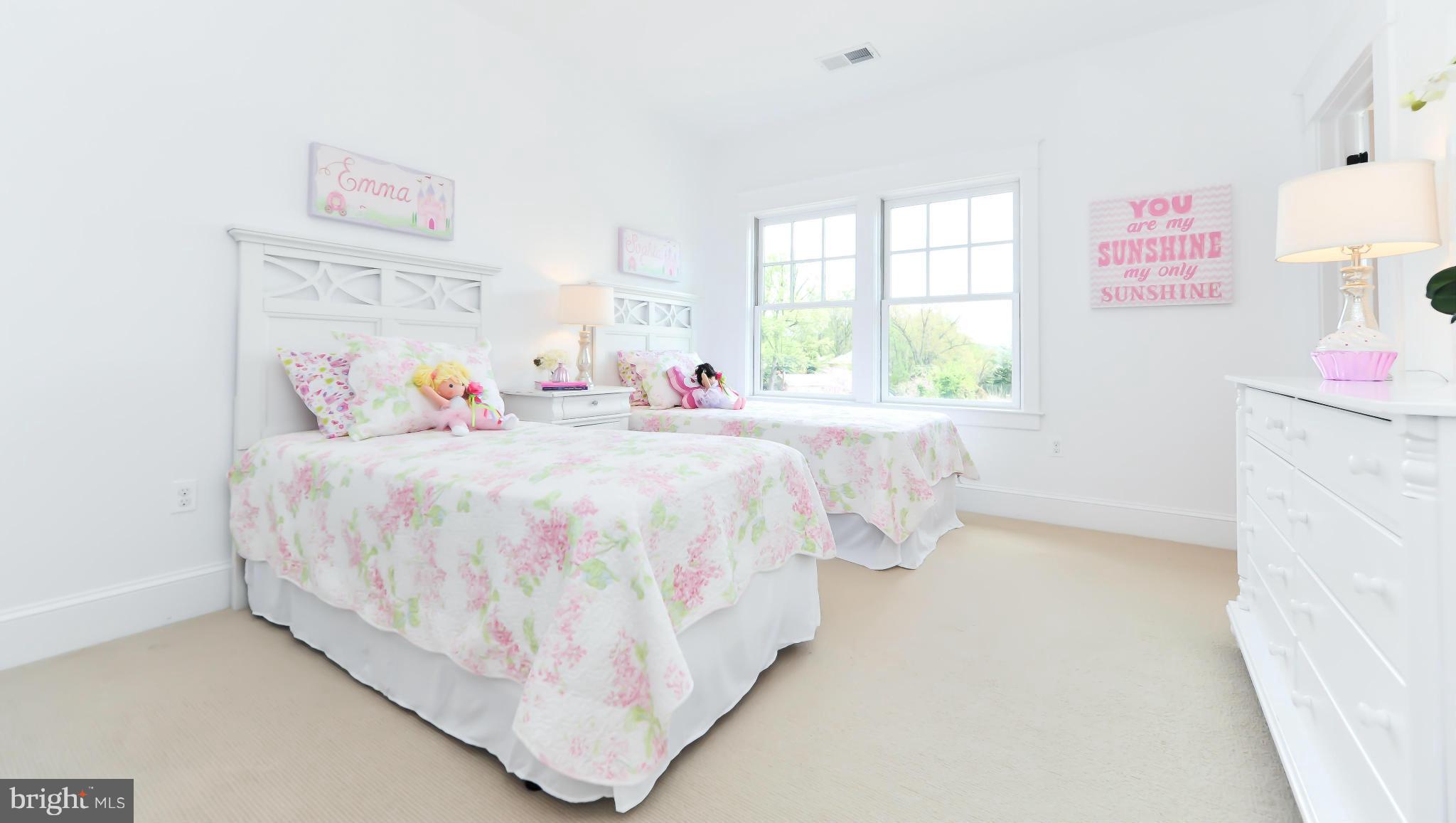 2735 Lorcom Lane Arlington, VA 22207 - Photo 23 of 30 a bedroom with bed and a window