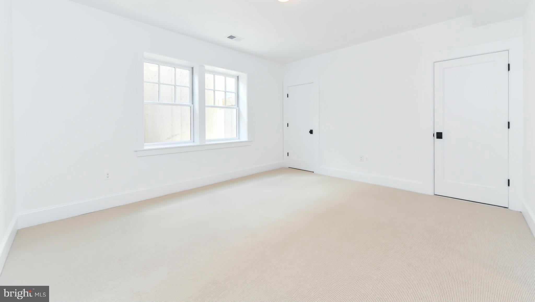 2735 Lorcom Lane Arlington, VA 22207 - Photo 27 of 30 an empty room with windows