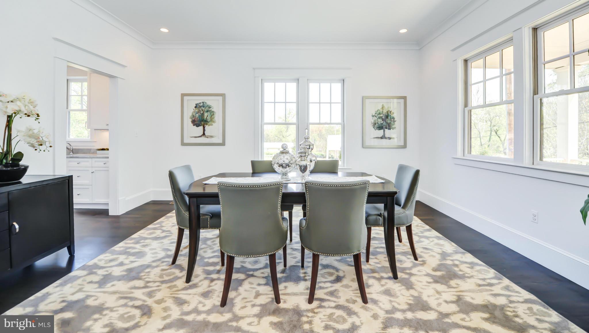 2735 Lorcom Lane Arlington, VA 22207 - Photo 6 of 30 a view of a dining room with furniture window and wooden floor