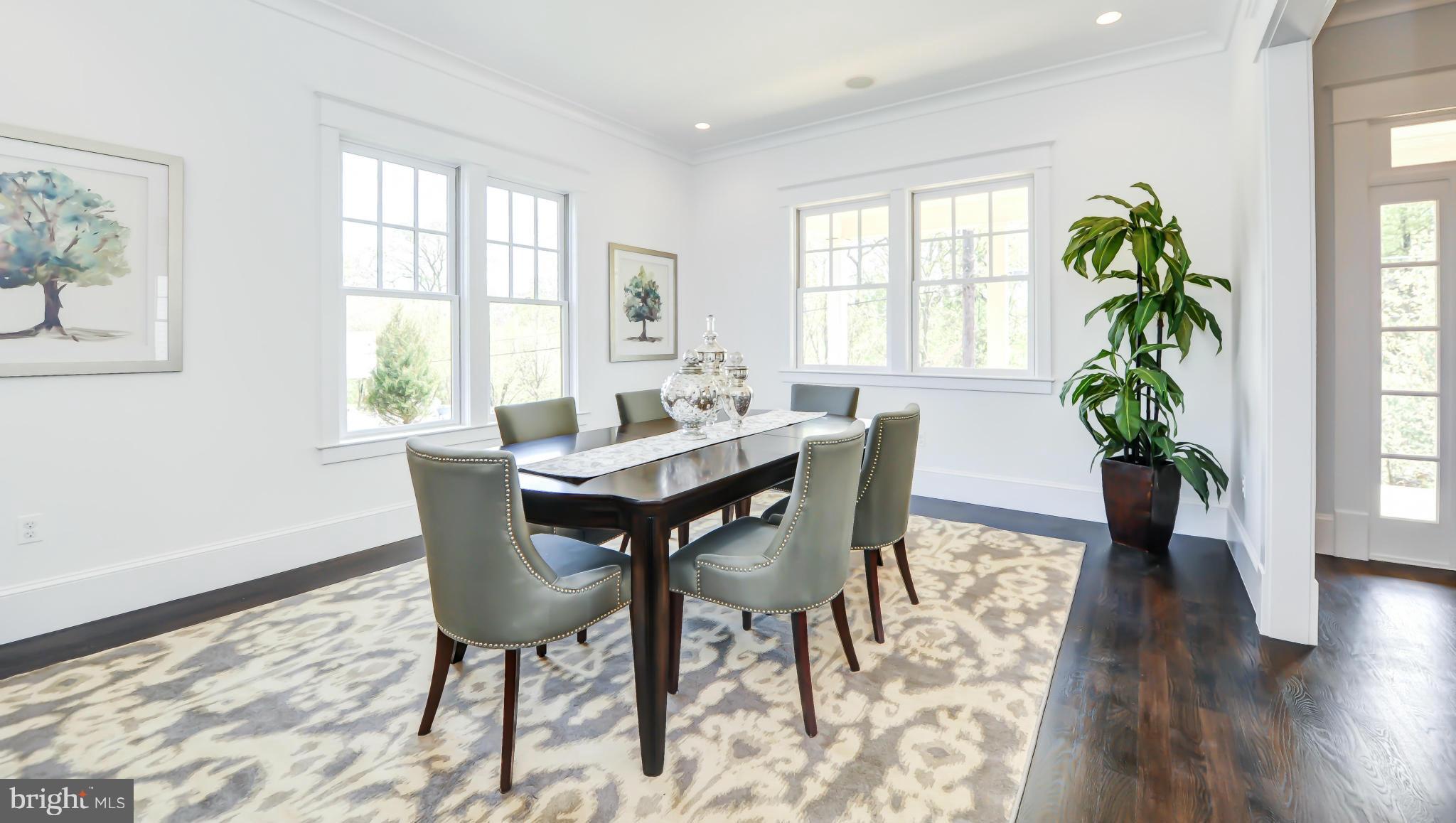 2735 Lorcom Lane Arlington, VA 22207 - Photo 7 of 30 a view of a dining room with furniture window and wooden floor