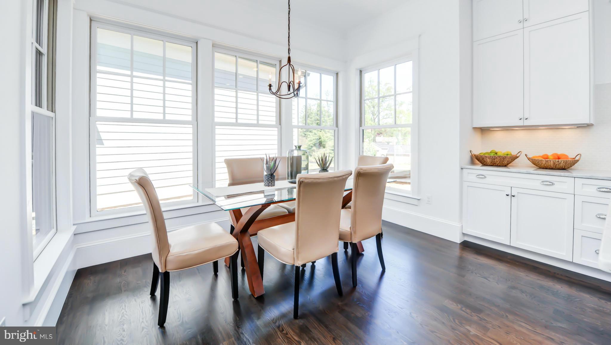 2735 Lorcom Lane Arlington, VA 22207 - Photo 10 of 30 a view of a dining room with furniture window and wooden floor