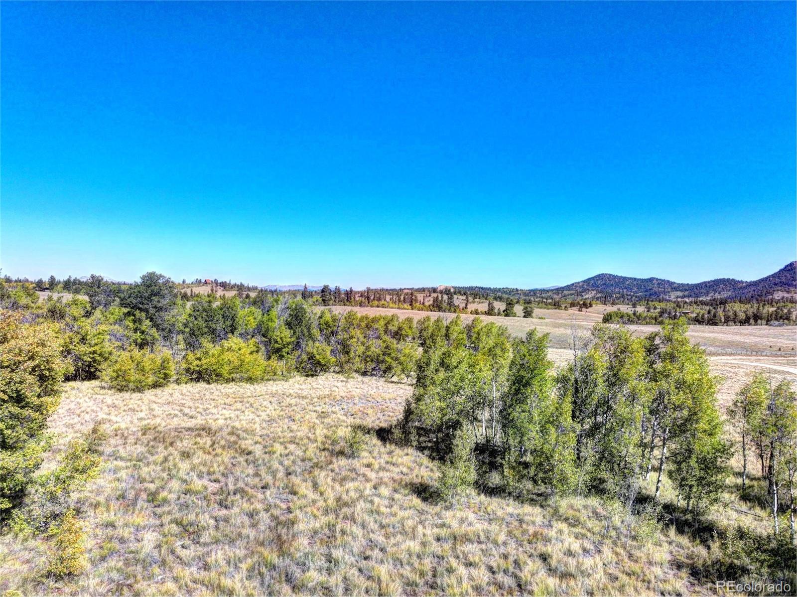 225 Antelope Way Como, CO 80432 - Photo 12 of 20 a view of lake with mountain in background