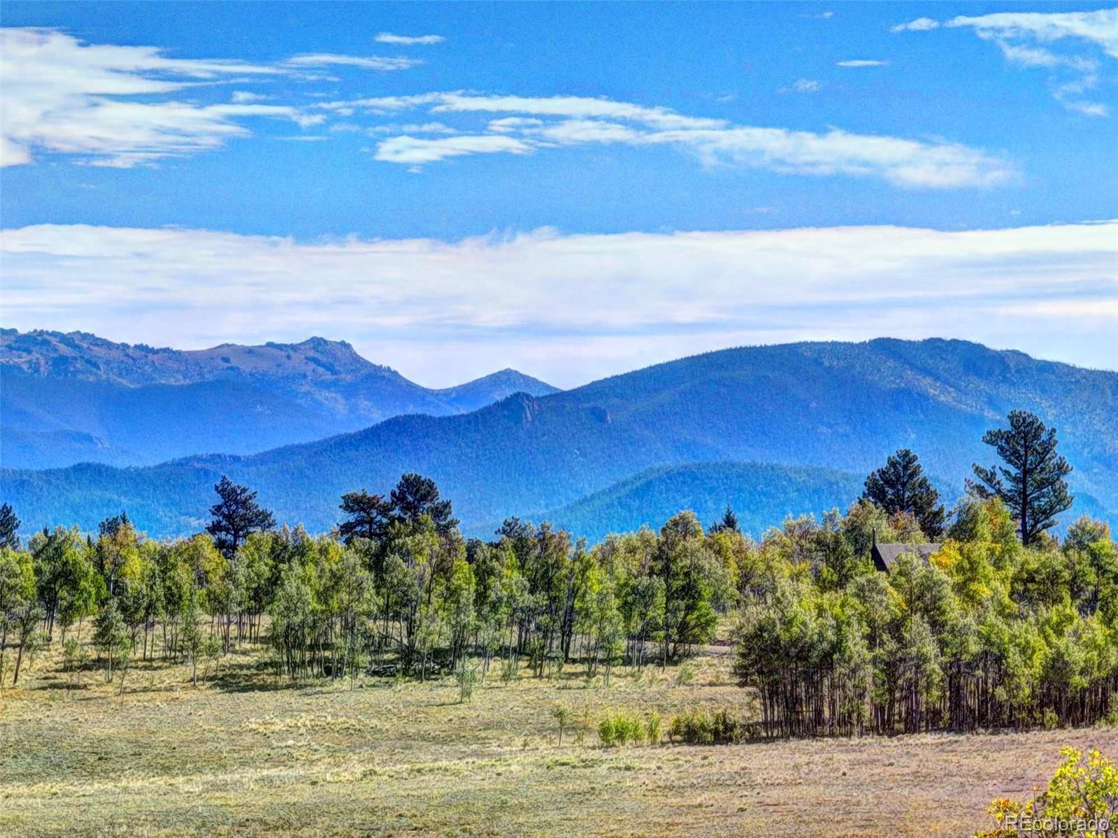 225 Antelope Way Como, CO 80432 - Photo 14 of 20 a view of a lake with sunset