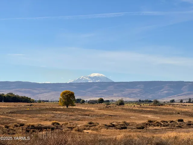 a view of ocean with mountain
