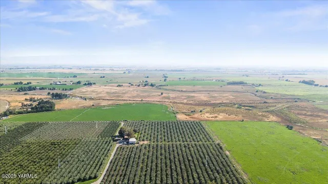 an aerial view of a houses with outdoor space