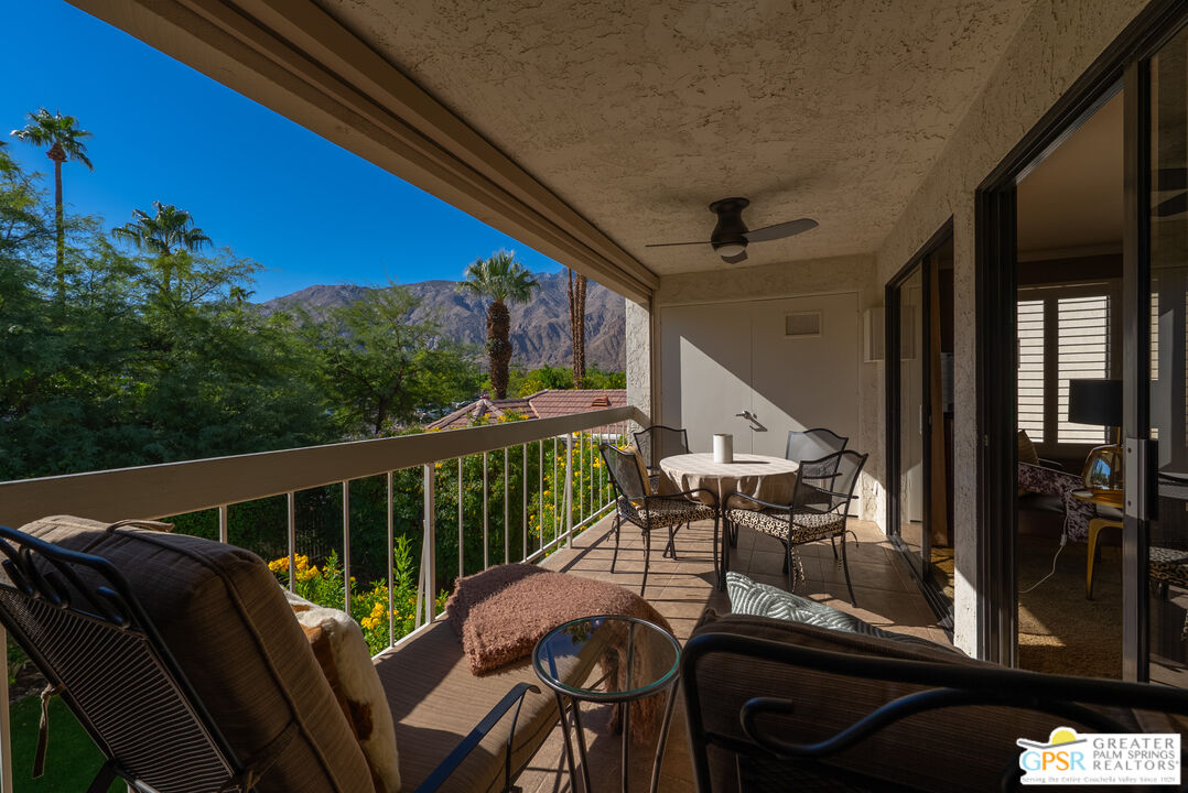 325 East Via Escuela, Unit 324 Palm Springs, CA 92262 - Photo 21 of 29 a view of balcony with furniture