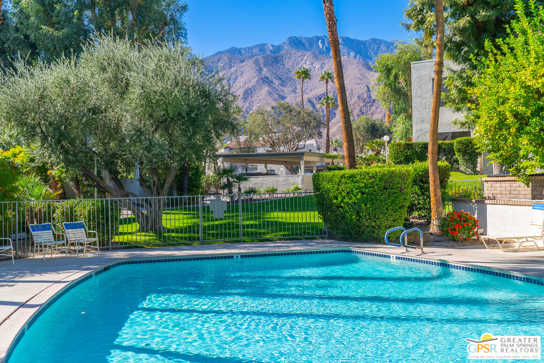 325 East Via Escuela, Unit 324 Palm Springs, CA 92262 - Photo 3 of 29 a view of a park with houses