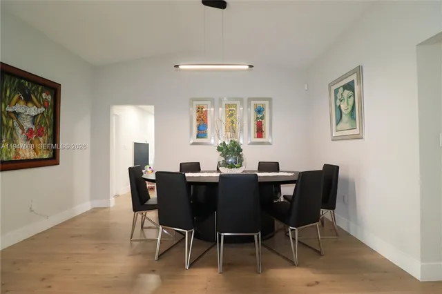 a view of a dining room with furniture