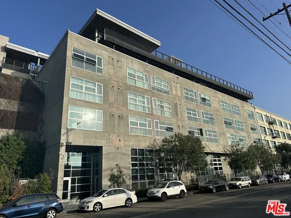a front view of a building with street view