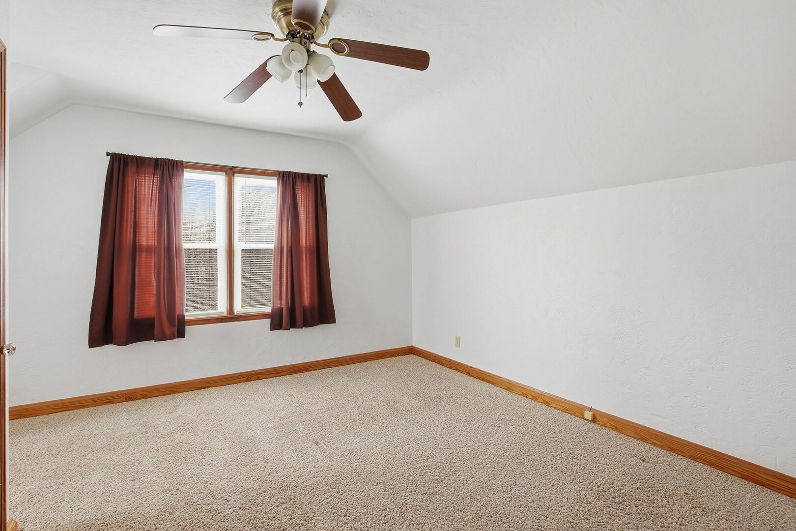 608 7th Avenue Silvis, IL 61282 - Photo 17 of 38 a view of an empty room with window and a kitchen