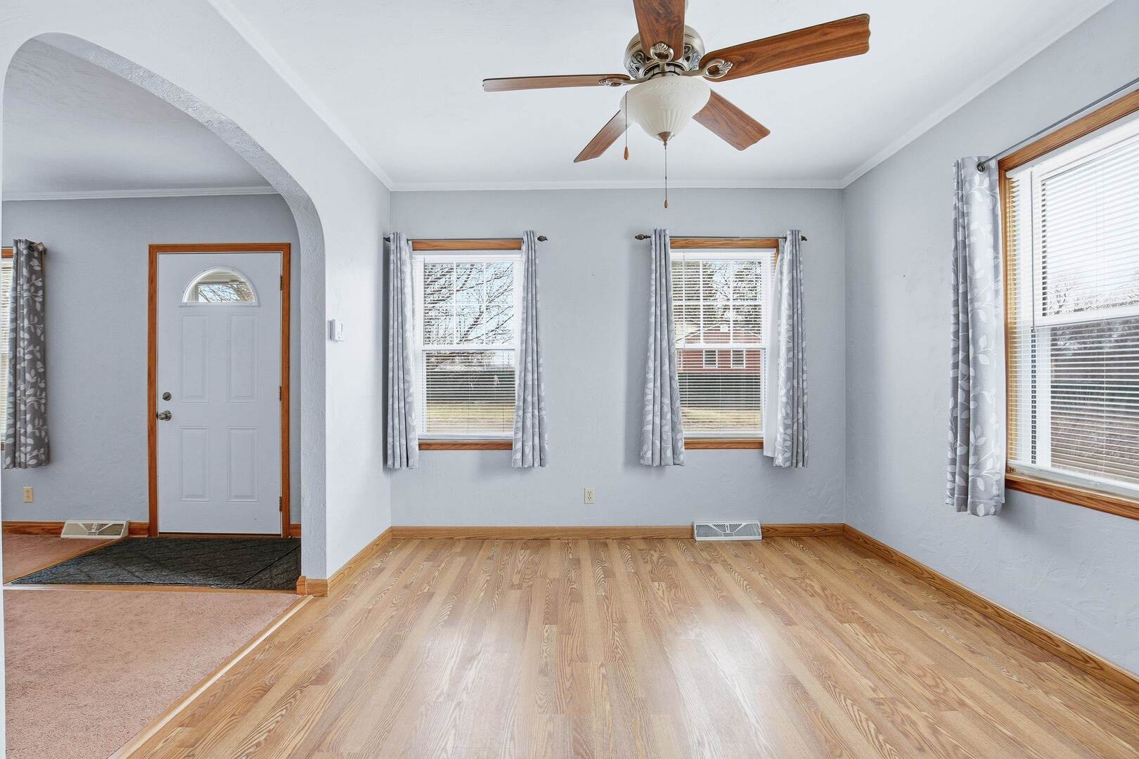 608 7th Avenue Silvis, IL 61282 - Photo 9 of 38 wooden floor in an empty room with a window