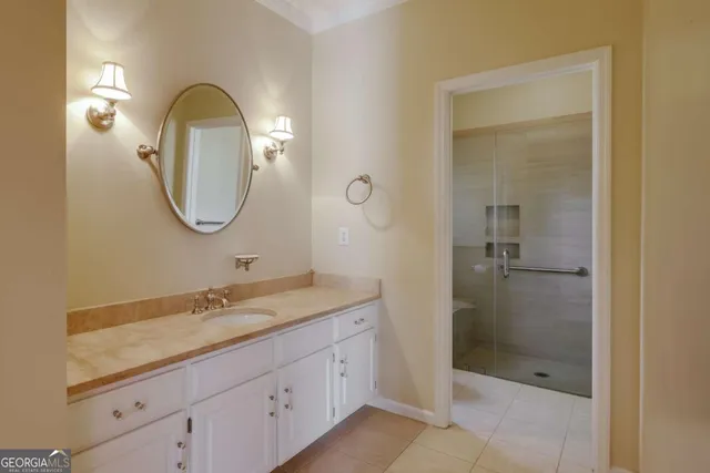 a bath tub sitting in a bathroom next to a window