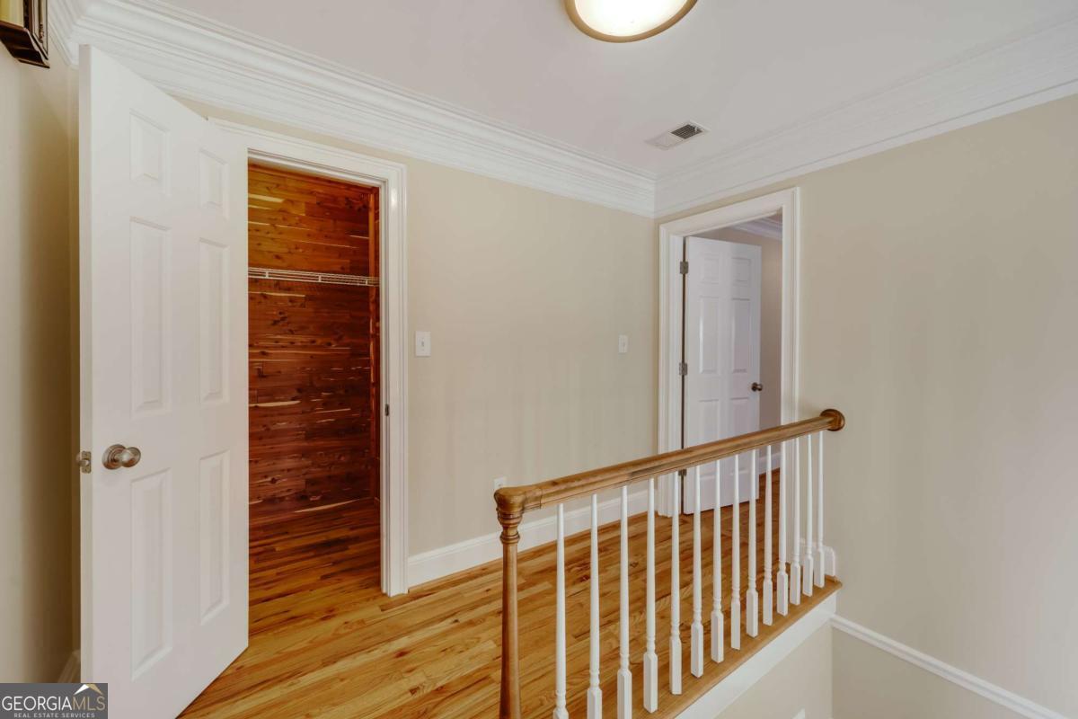 150 Walton Creek Road Athens, GA 30607 - Photo 34 of 72 a view of a hallway with wooden floor and entryway