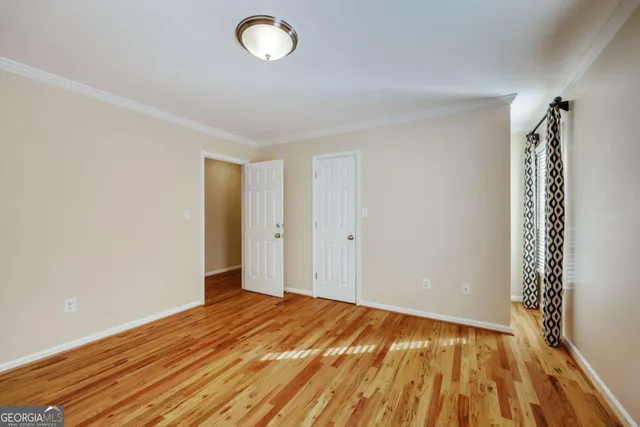 an aerial view of house with yard and swimming pool