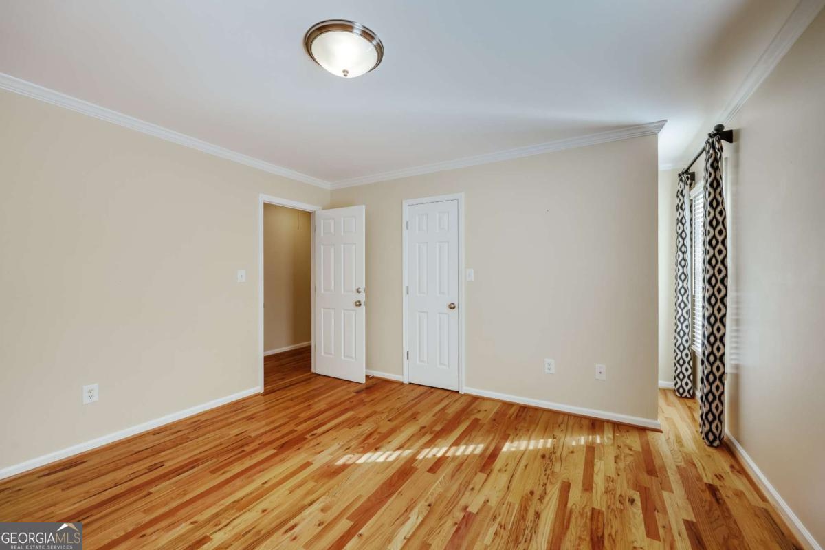 150 Walton Creek Road Athens, GA 30607 - Photo 48 of 72 a view of a room with wooden floor and a window
