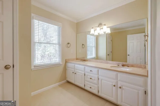a view of a water fountain in front of a house