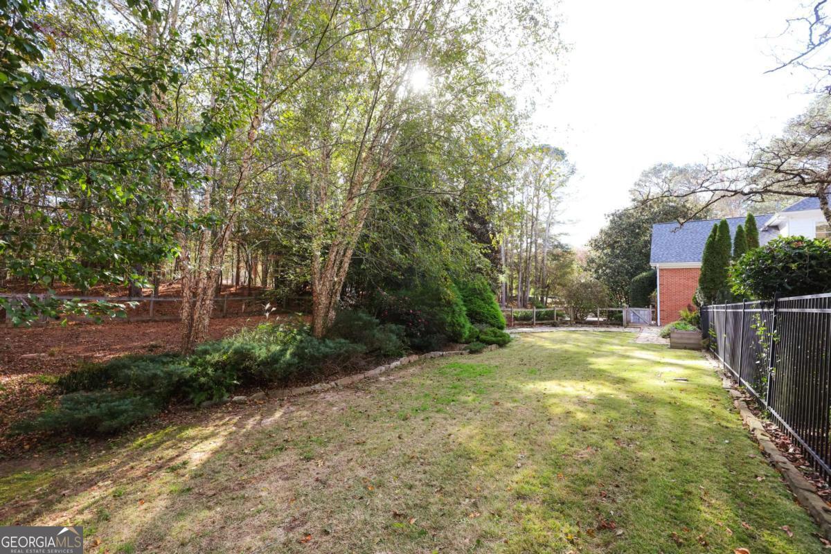 150 Walton Creek Road Athens, GA 30607 - Photo 63 of 72 a view of a yard with plants and trees