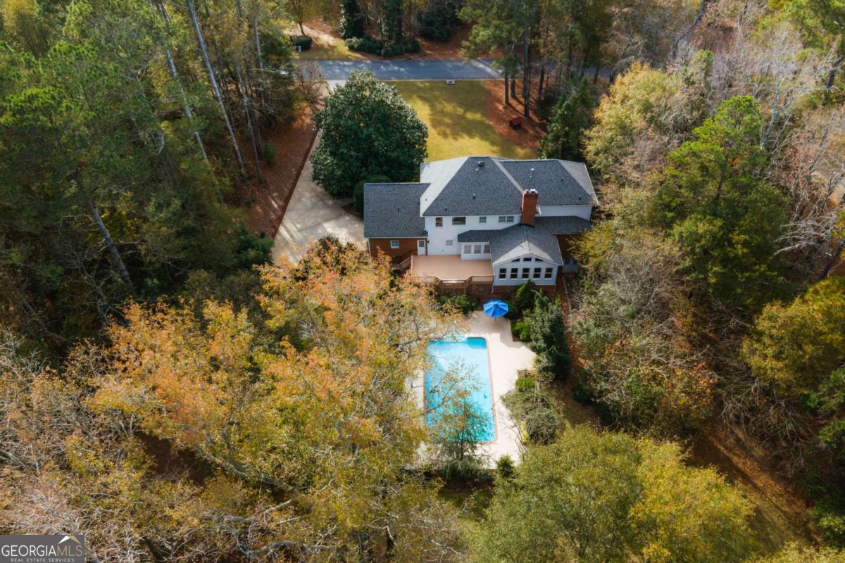 150 Walton Creek Road Athens, GA 30607 - Photo 68 of 72 a view of a water fountain in front of a house