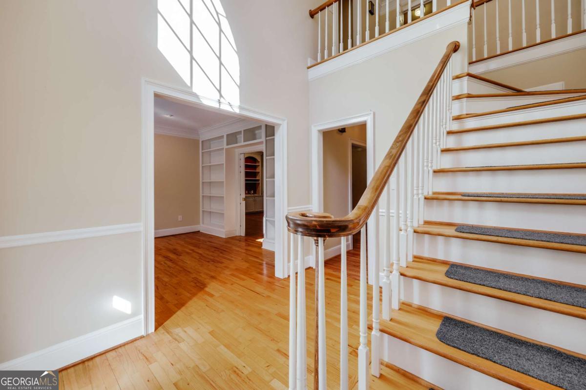 150 Walton Creek Road Athens, GA 30607 - Photo 7 of 72 a view of entryway with wooden floor and front door