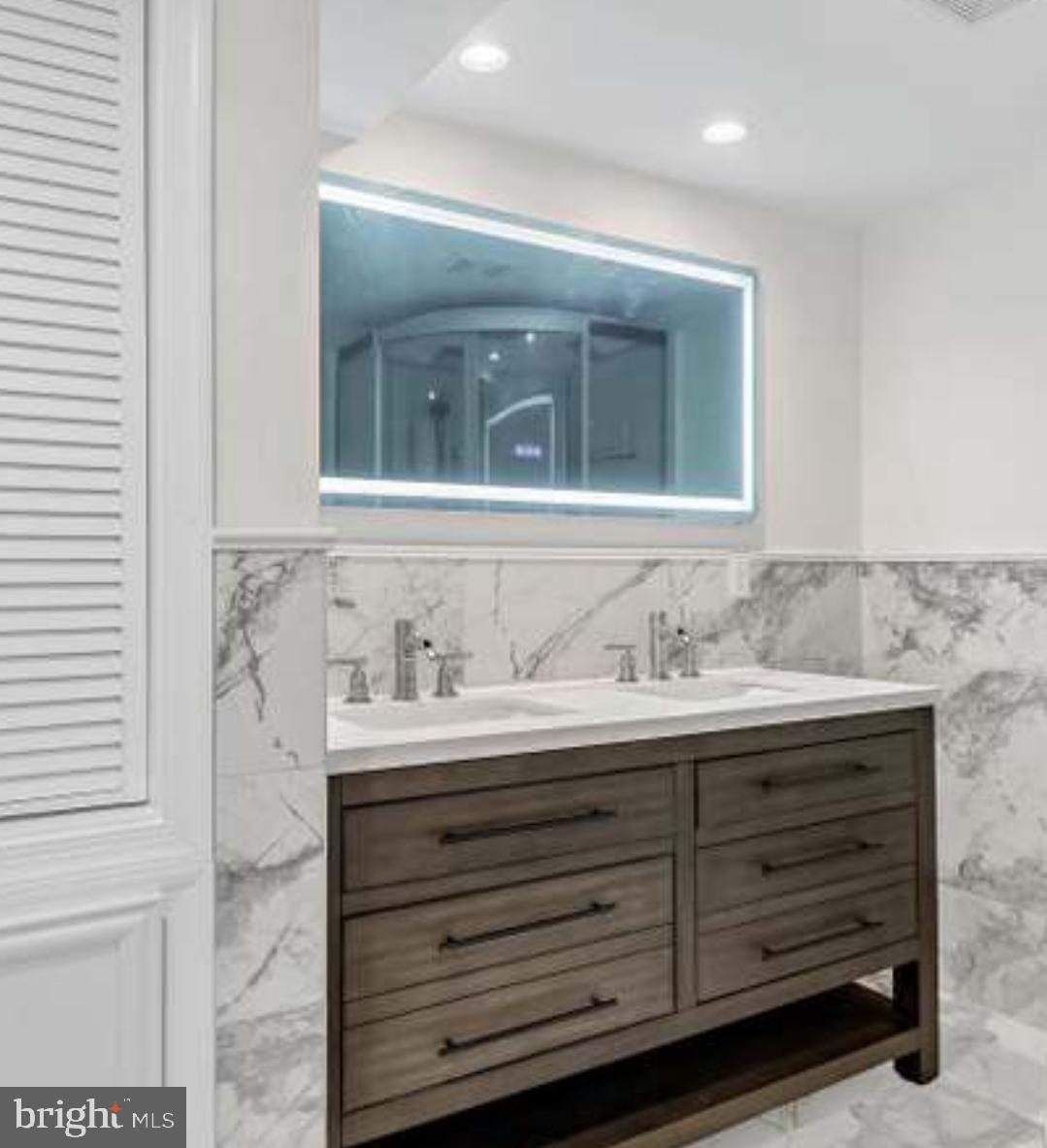40 Sandy Court Hanover, PA 17331 - Photo 16 of 19 a bathroom with a sink and a mirror