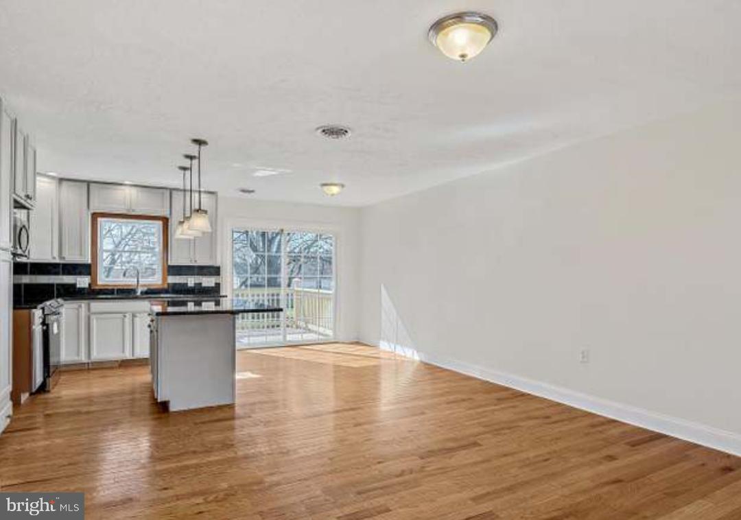 40 Sandy Court Hanover, PA 17331 - Photo 5 of 19 a kitchen with a refrigerator and a stove top oven