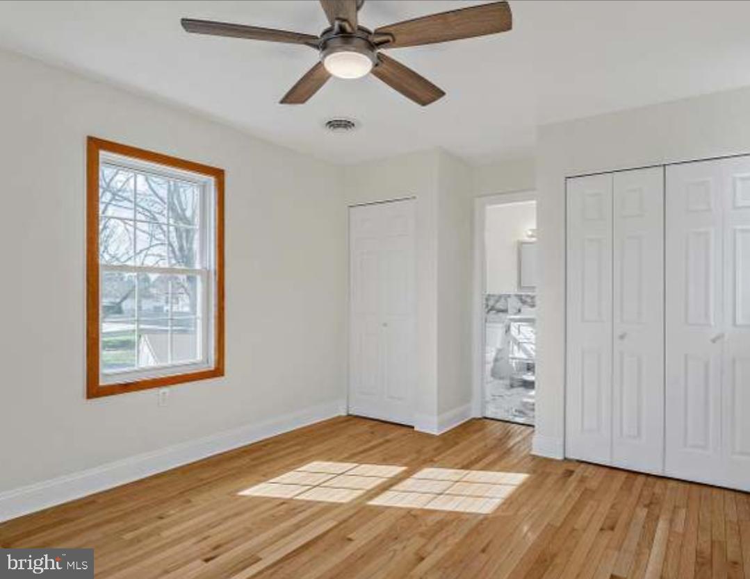 40 Sandy Court Hanover, PA 17331 - Photo 9 of 19 a view of empty room with wooden floor and fan
