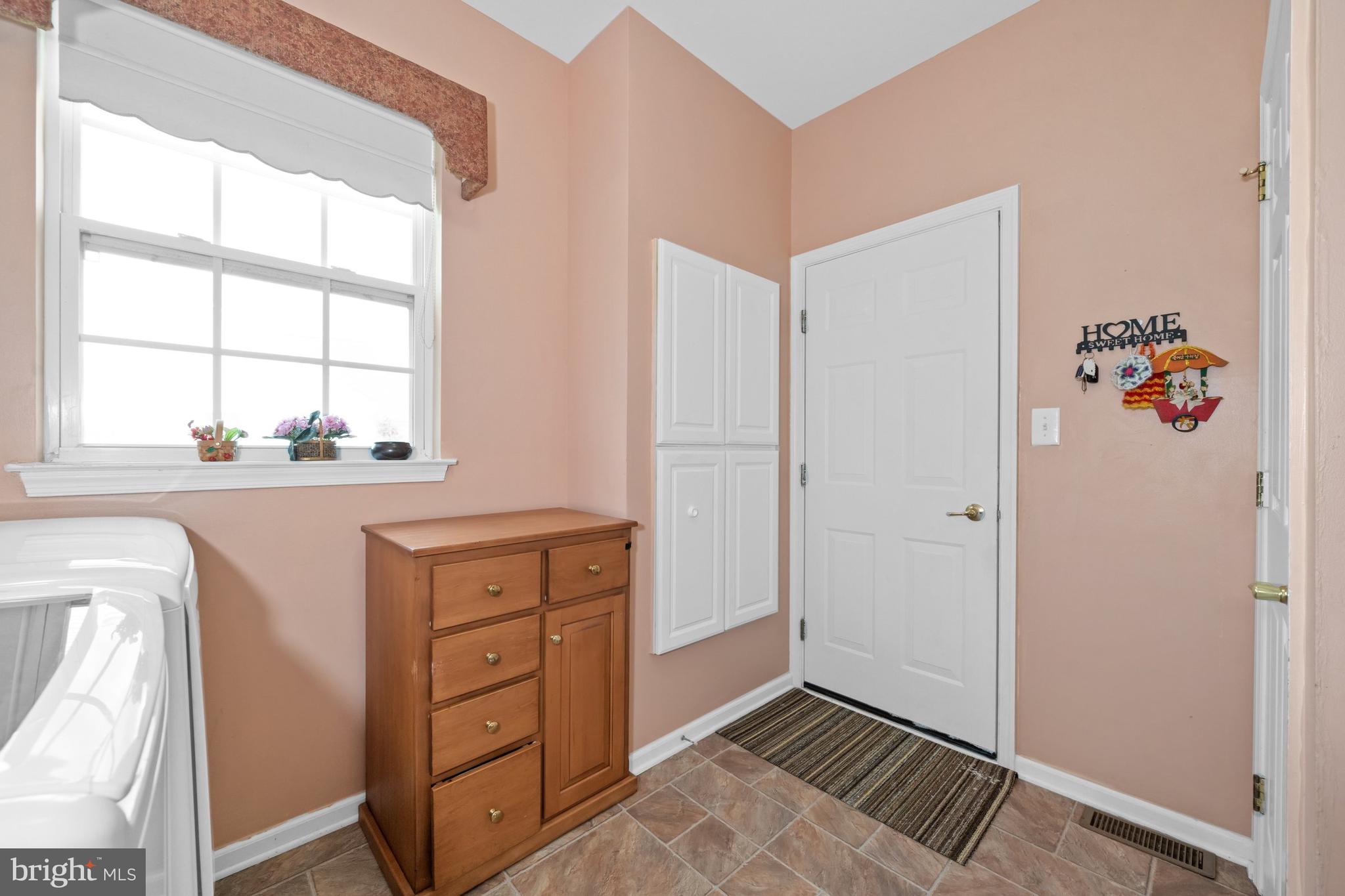 56 Springmill Drive Middletown, DE 19709 - Photo 13 of 21 Laundry room with access to garage & basement.